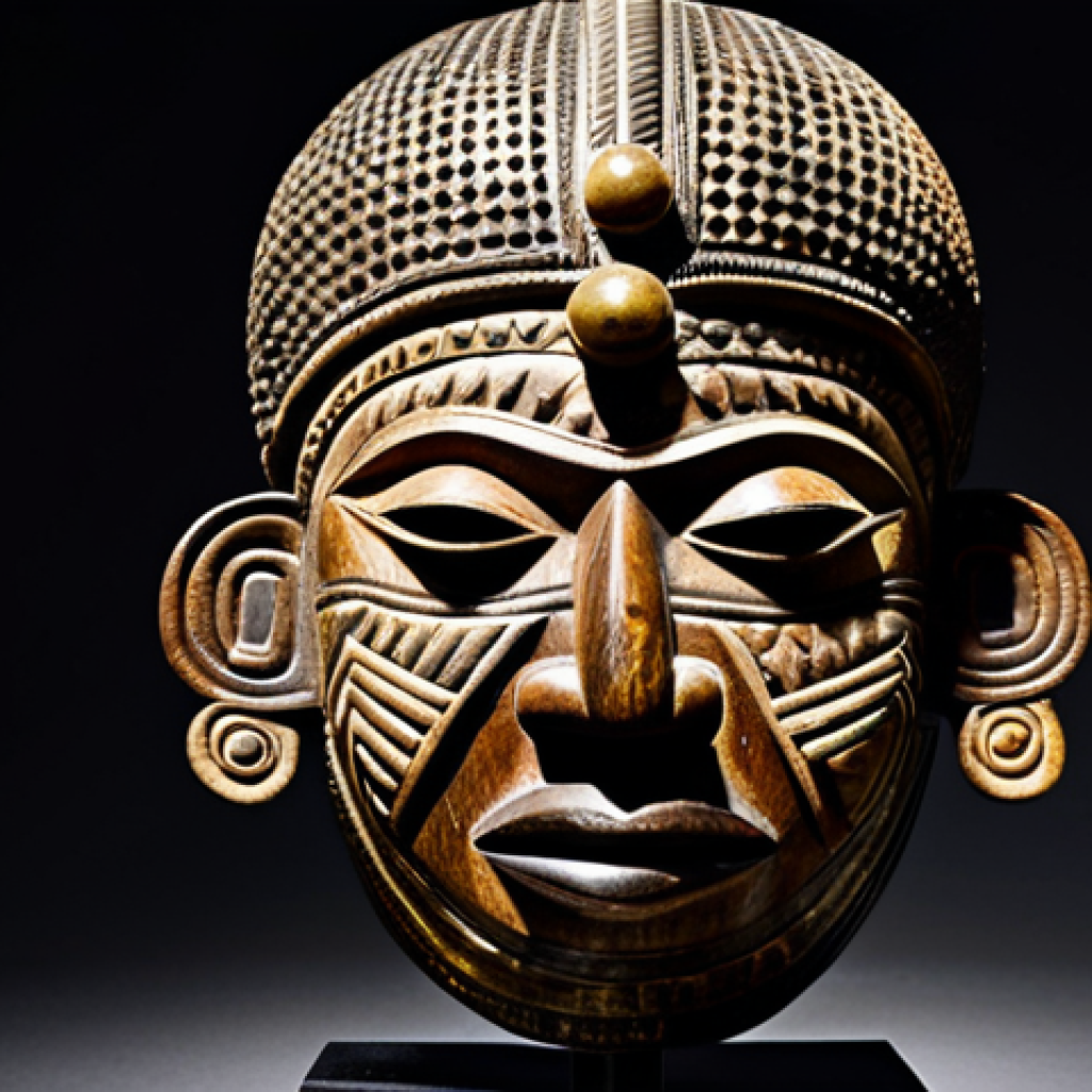 A stunning, highly detailed Benin bronze head, sculpted with the lost wax technique, showcasing masterful craftsmanship and intricate traditional patterns. The bronze has a rich, polished patina, reflecting ambient light. It is elegantly displayed on a pedestal in a pristine, well-lit museum gallery, with a subtle, dark background emphasizing its historical significance. Nearby, a beautifully carved Benin wooden mask with natural pigments adds textural contrast. Professional museum photography, high-resolution, sharp focus, faithful representation, safe for work, appropriate content, fully clothed, professional, modest, family-friendly.